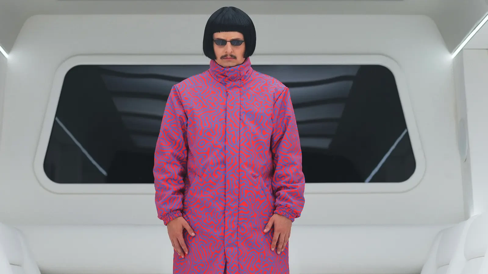 Oliver Tree con il suo iconico taglio a scodella, occhiali da sole e tuta acetata oversize
