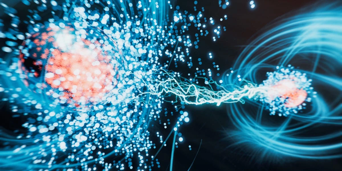 Illustrazione concettuale di particelle subatomiche e interazioni energetiche